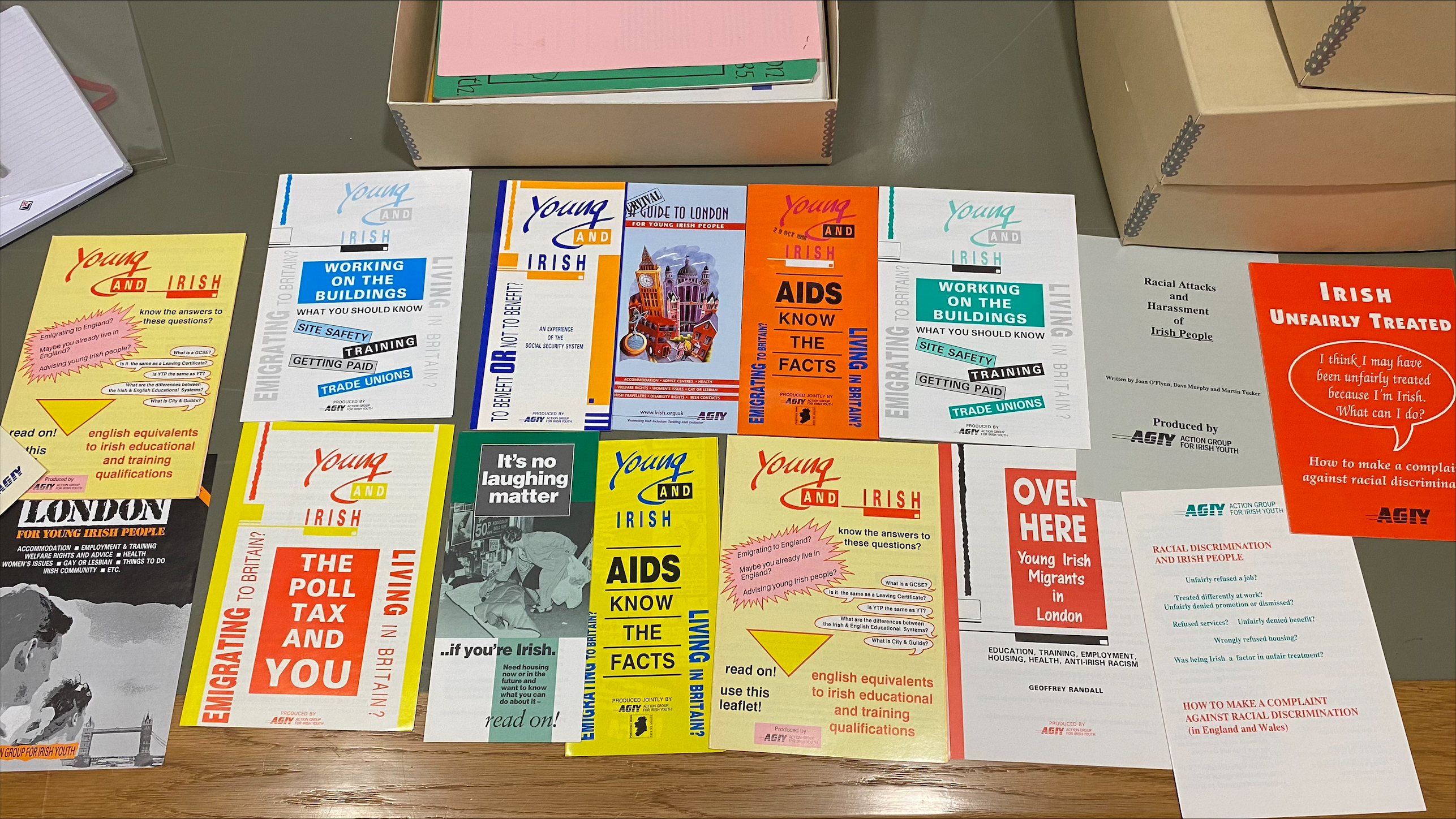 A display of archive leaflets and pamphlets about Irish LGBTQ+ activities and groups in past table on LGBT+