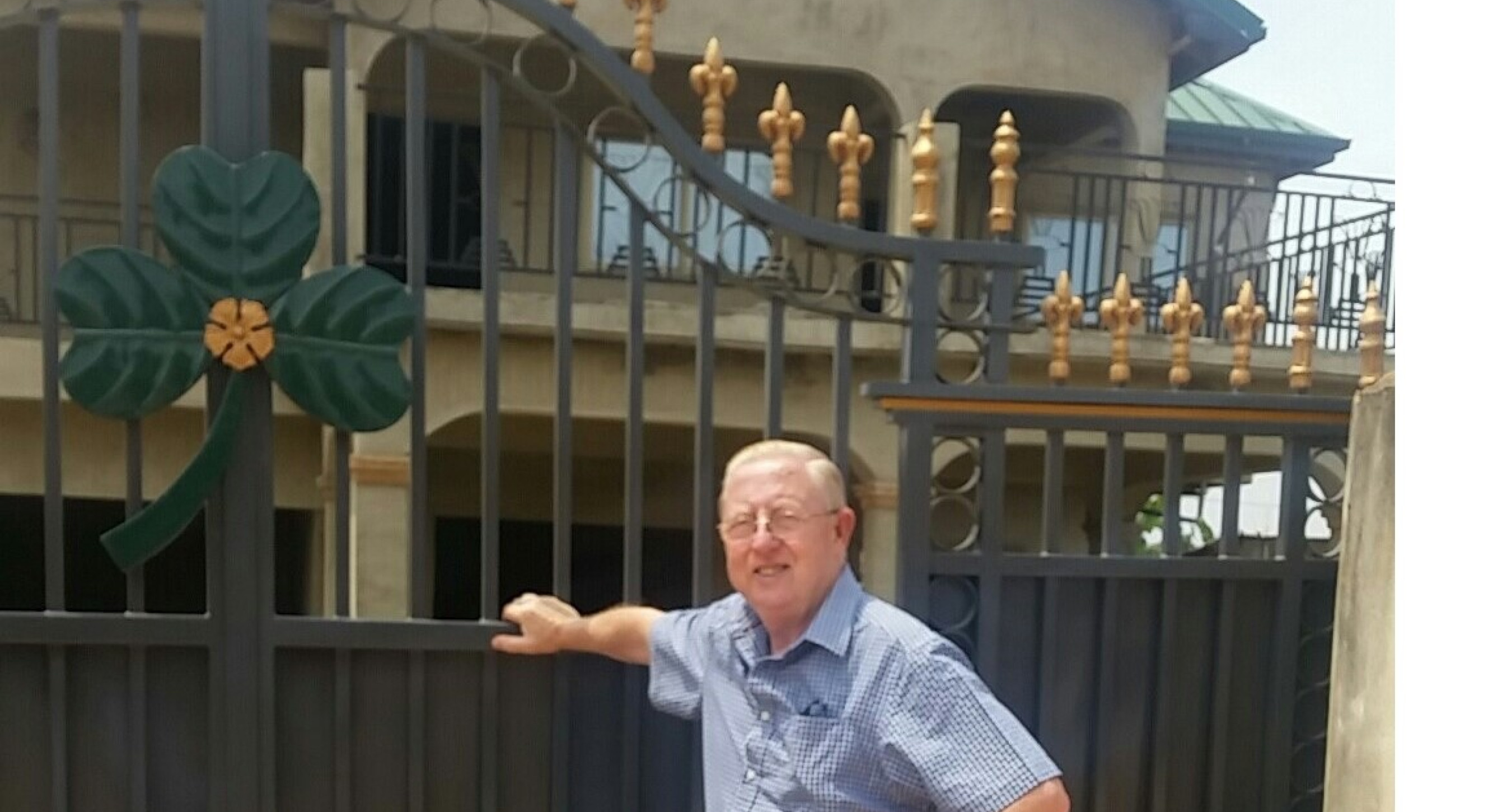 Larry Dullaghan at his shamrock gate
