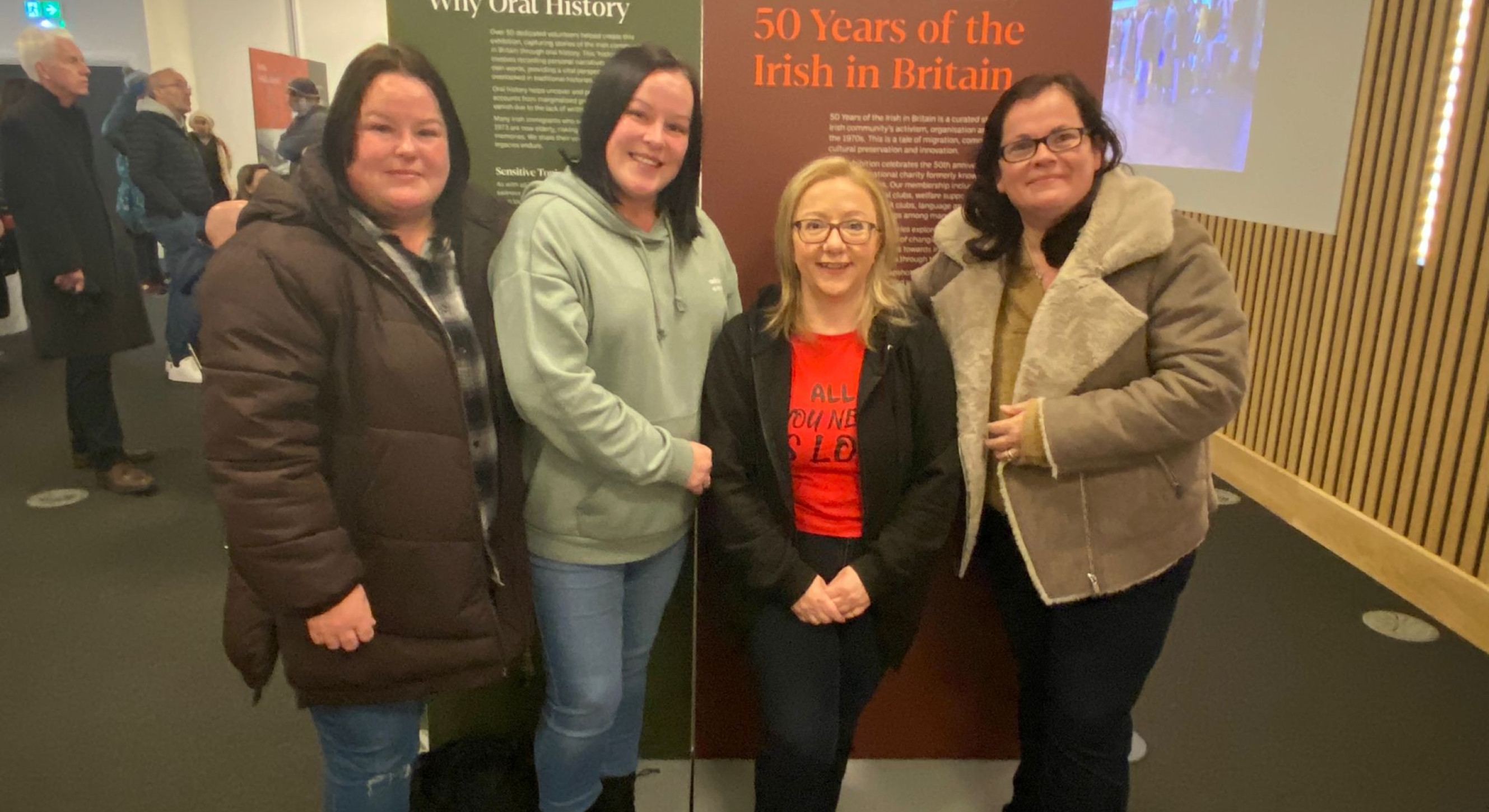 Caroline, Donna and Bez Keane, who won their legal case for the right to have an Irish inscription on their mother's grave with volunteer Eileen Doyle (in red)